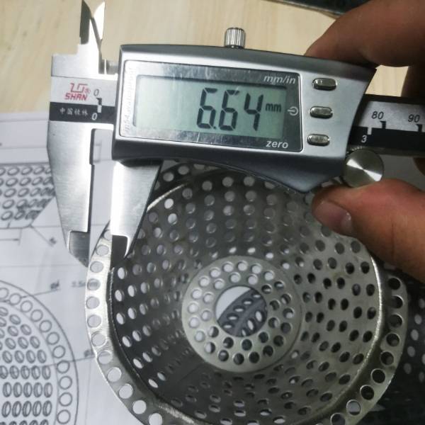 The bowl edge width of the bowl-shape perforated filter is 6.64 mm.