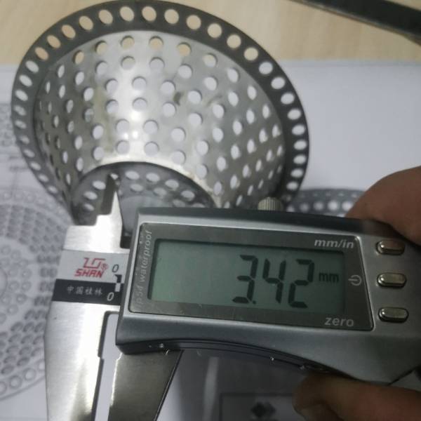 The hole size of the bowl-shape perforated filter is 3.42 mm.