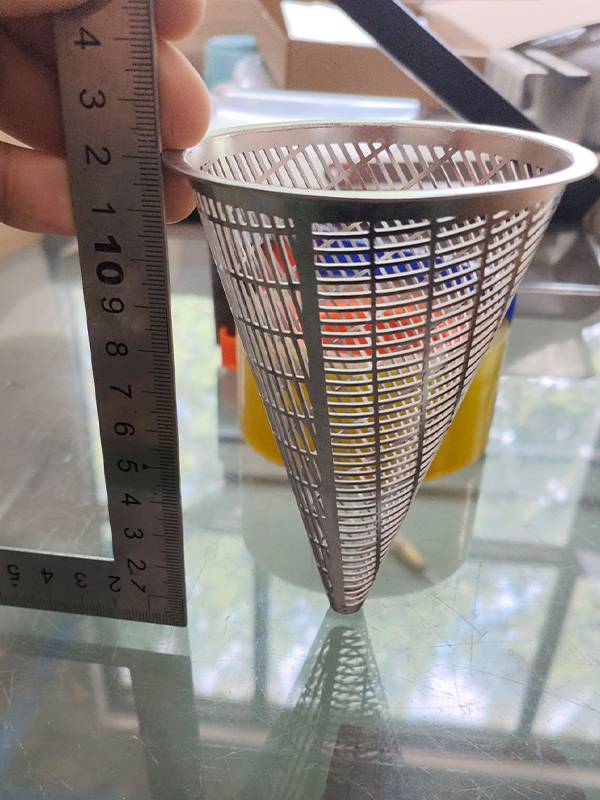 Total height of cone strainer is 12.1 cm measured with a straightedge.
