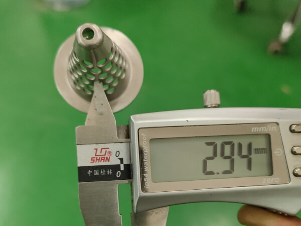 The hole size of the small conical perforated filter element is 2.94 mm.