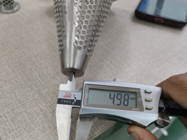 The top inner diameter of the small conical perforated filter element is 3.44 mm