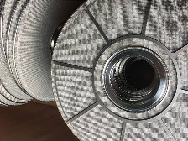 Some finished leaf disc filters listed in wooden crates