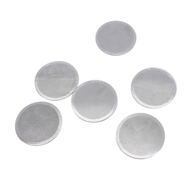 A picture of many round extruder screens